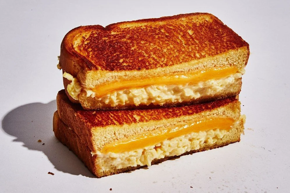 A tempting breakfast sandwich showcasing various toppings
